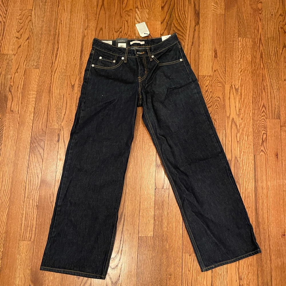 Levis low loose, dark wash, size 27, inseam 30.  New with tags.